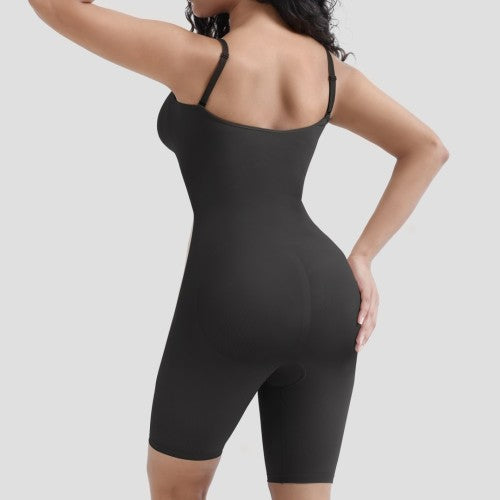 Black bodysuit worn by a model on a light gray background