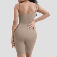 Beige shapewear garment worn by a model on a plain background