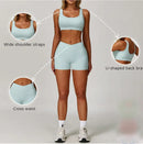 Light blue sports bra and shorts set with highlighted features