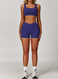 Person wearing a blue athletic outfit