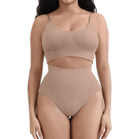 Woman wearing a beige ribbed two-piece set on a white background
