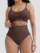 Woman wearing a brown bikini set on a white background