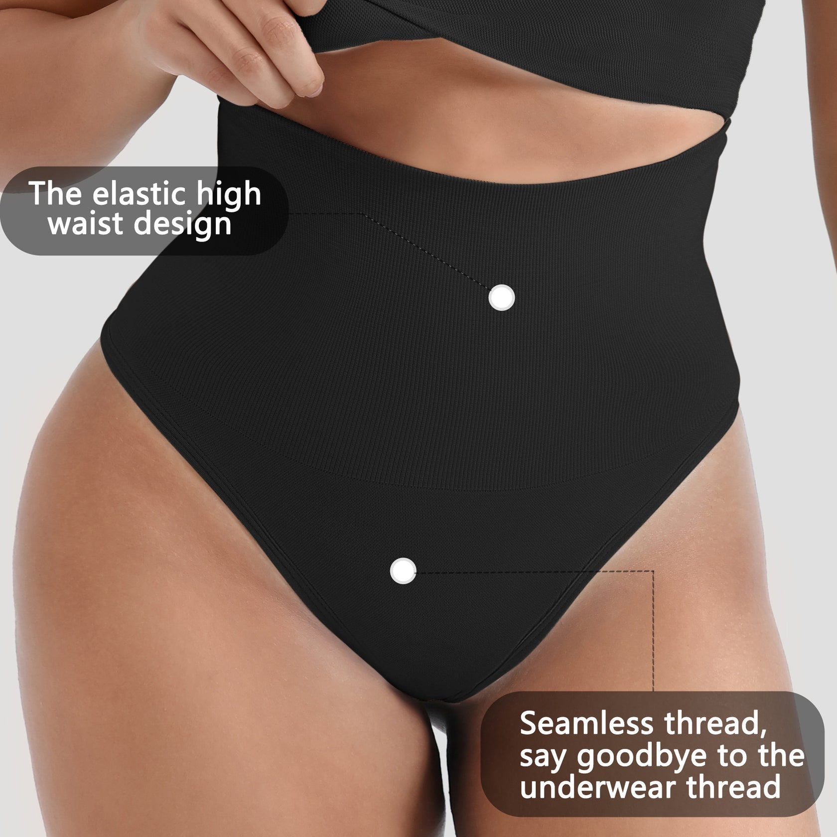Black high-waisted underwear with elastic waistband on a neutral background
